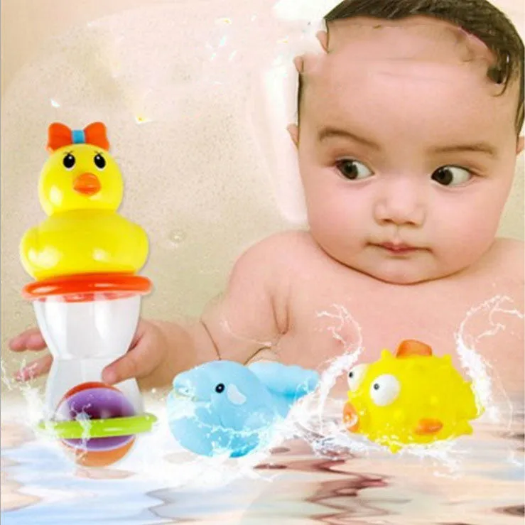 Baby Playing In The Water With A Duck Toy